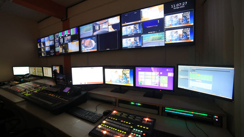 Janam TV News channel's Master Control Room - A seamlessly integrated setup by RGB Broadcasting featuring Master control switch, Master control automation, Router control panel, Graphics, Multi-viewer, Clock, Intercom Panel, Audio Monitor, and more. Demonstrating RGB's expertise in comprehensive broadcast solutions.