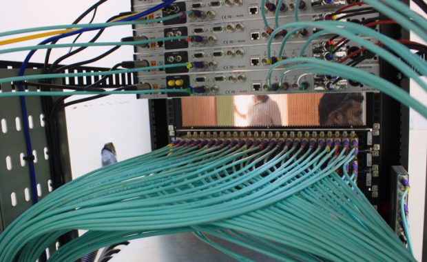 Central Apparatus Room of Al Ain Equestrian Club where Cables Connected to Patch Panels for Media Connectivity.